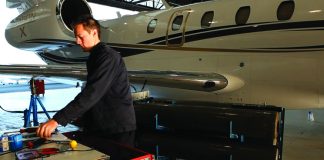 Engineer in hangar working on Citation X