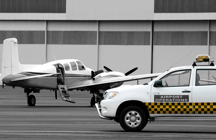 Airport Operations vehicle on tarmac