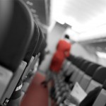 Cabin crew walking inside aircraft