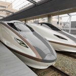 Two E7 series Shinkansen bullet trains at JR Nagano Station in Nagano, Japan