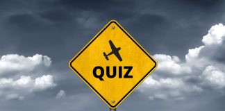 road sign with the word quiz