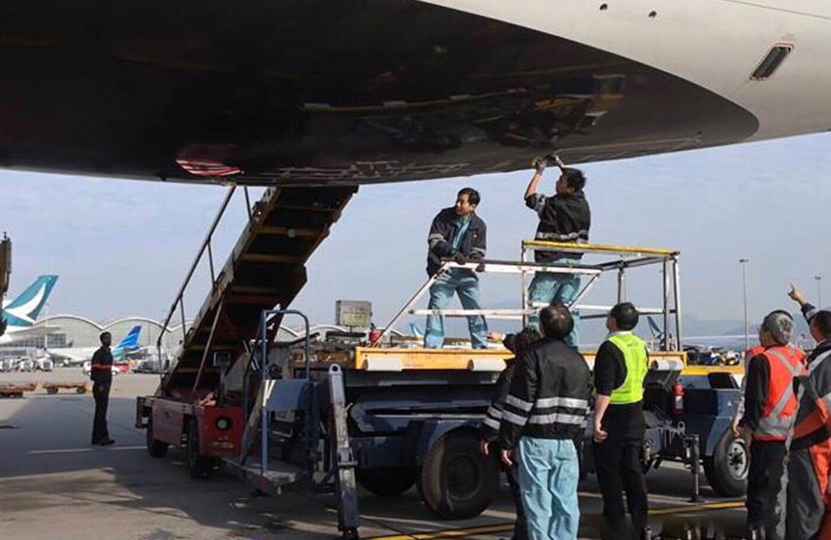 Boeing 777 damaged tail inspection