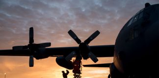 The sun rises over a flight line of C-130H Hercules in the early morning at the 179th Airlift Wing, Mansfield, Ohio, as maintainers perform engine runs, Dec. 21, 2017. The 179th Airlift Wing is always on a mission to be the first choice to respond to state and federal missions with a trusted team of Airmen.