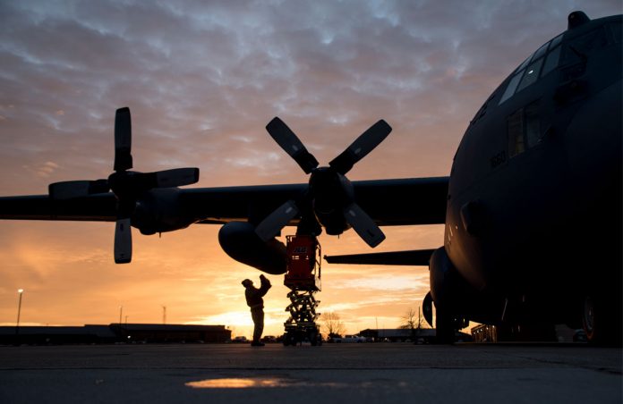 The sun rises over a flight line of C-130H Hercules in the early morning at the 179th Airlift Wing, Mansfield, Ohio, as maintainers perform engine runs, Dec. 21, 2017. The 179th Airlift Wing is always on a mission to be the first choice to respond to state and federal missions with a trusted team of Airmen.