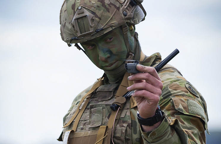An Australian Army soldier prepares to launch a PD-100 Black Hornet miniature unmanned aerial vehicle during Exercise Chong Ju at Puckapunyal training area, north of Melbourne in Victoria