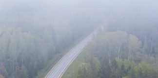 road obscured by low clouds