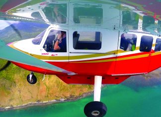 Airvan flying along the coast