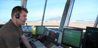 A Royal Australian Air Force (RAAF) air traffic controller in Townsville air traffic control tower