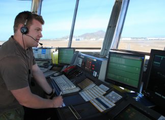 A Royal Australian Air Force (RAAF) air traffic controller in Townsville air traffic control tower