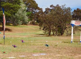 Racing drones taking off from the starting blocks at a Canberra Multirotor Racing Club race day.