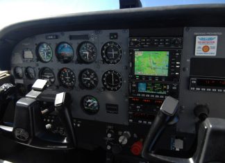 The instruments in the cockpit of a Cessna 172