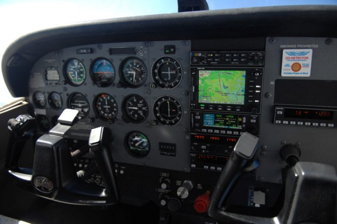 The instruments in the cockpit of a Cessna 172