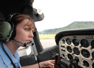 Sally Scott, CFI (Chief Flying Instructor) at North Queensland Aero Club (NQAC) preparing for take off in a Cessna 172N.