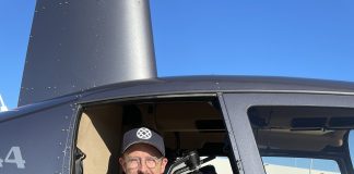 Production Company Owner, Corey Roberts filming from a helicopter in the early days of his career.