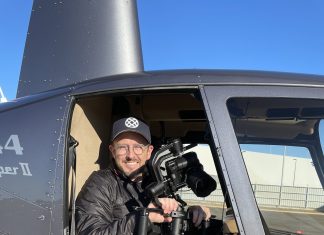 Production Company Owner, Corey Roberts filming from a helicopter in the early days of his career.