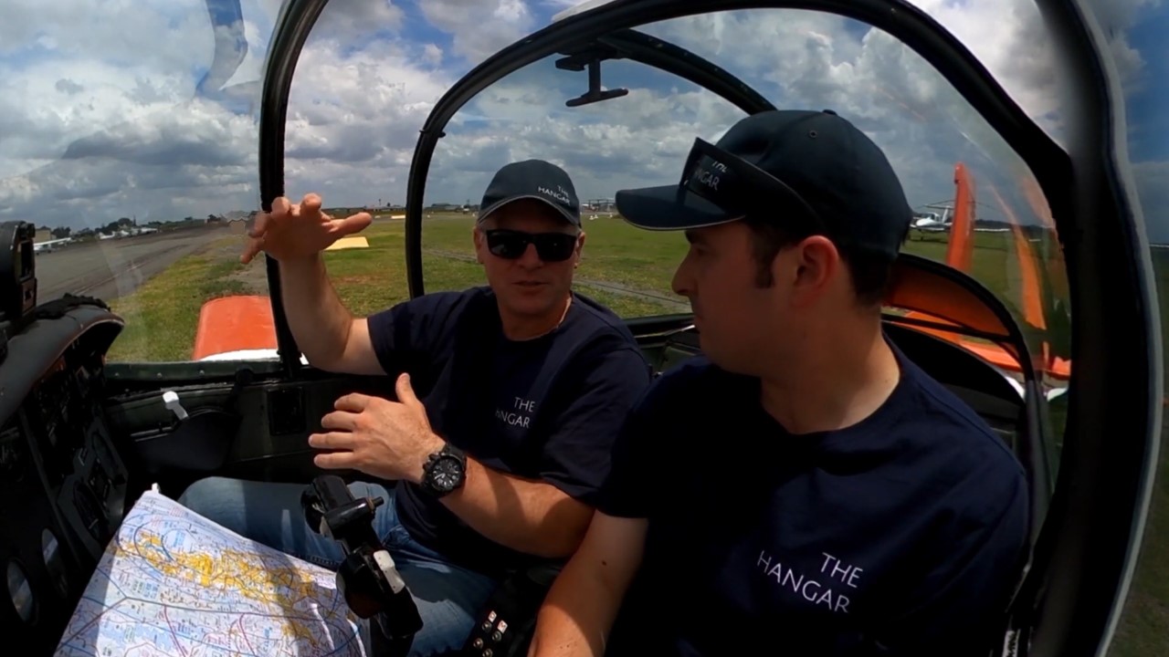 Ric Peapell and Nathan discuss a flight prior to one of The Hangar's youth mentoring programs. image: supplied