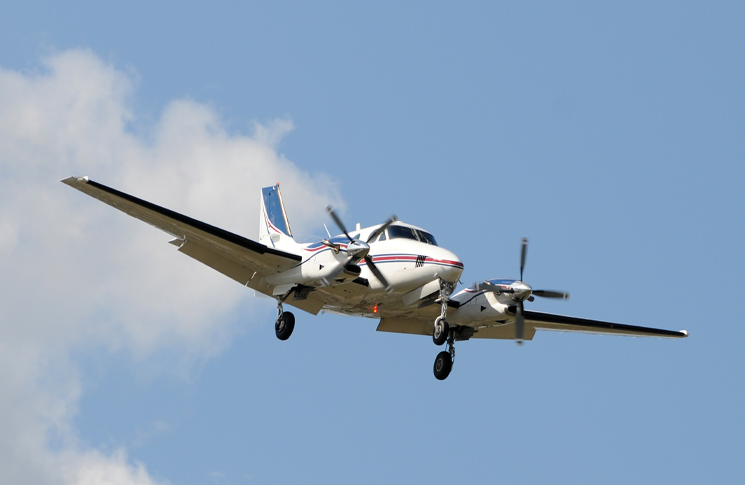 Plane with propellors flying in the sky