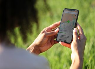 person looking at a drone safety app on their mobile phone