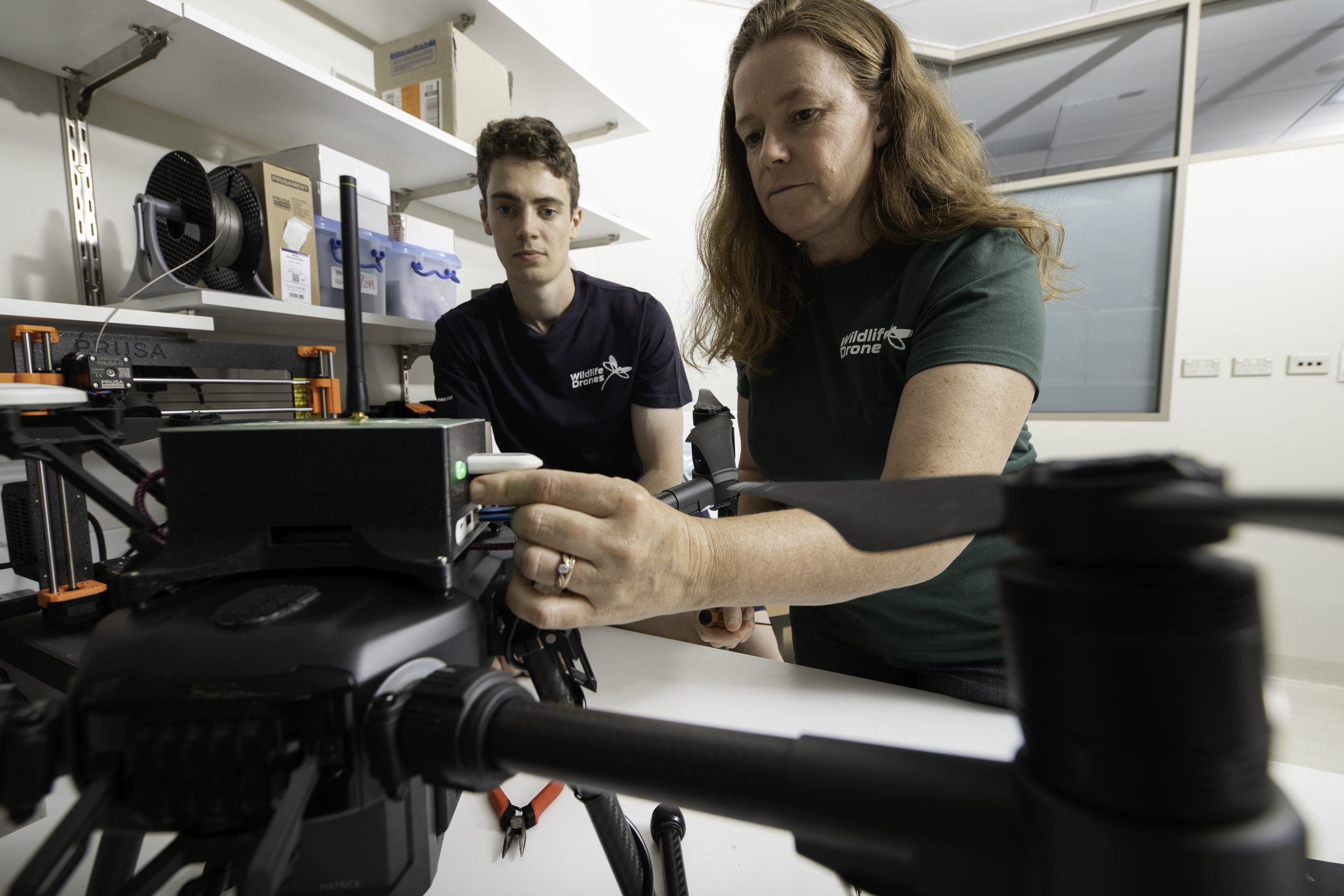 Debbie Saunders and Liam Kennedy setting up the drone in the lab.