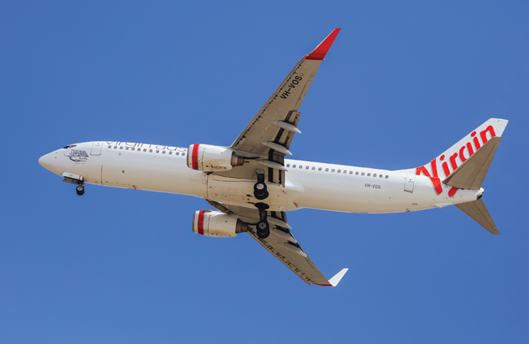 Virgin Airlines Boeing 737-8FE flying