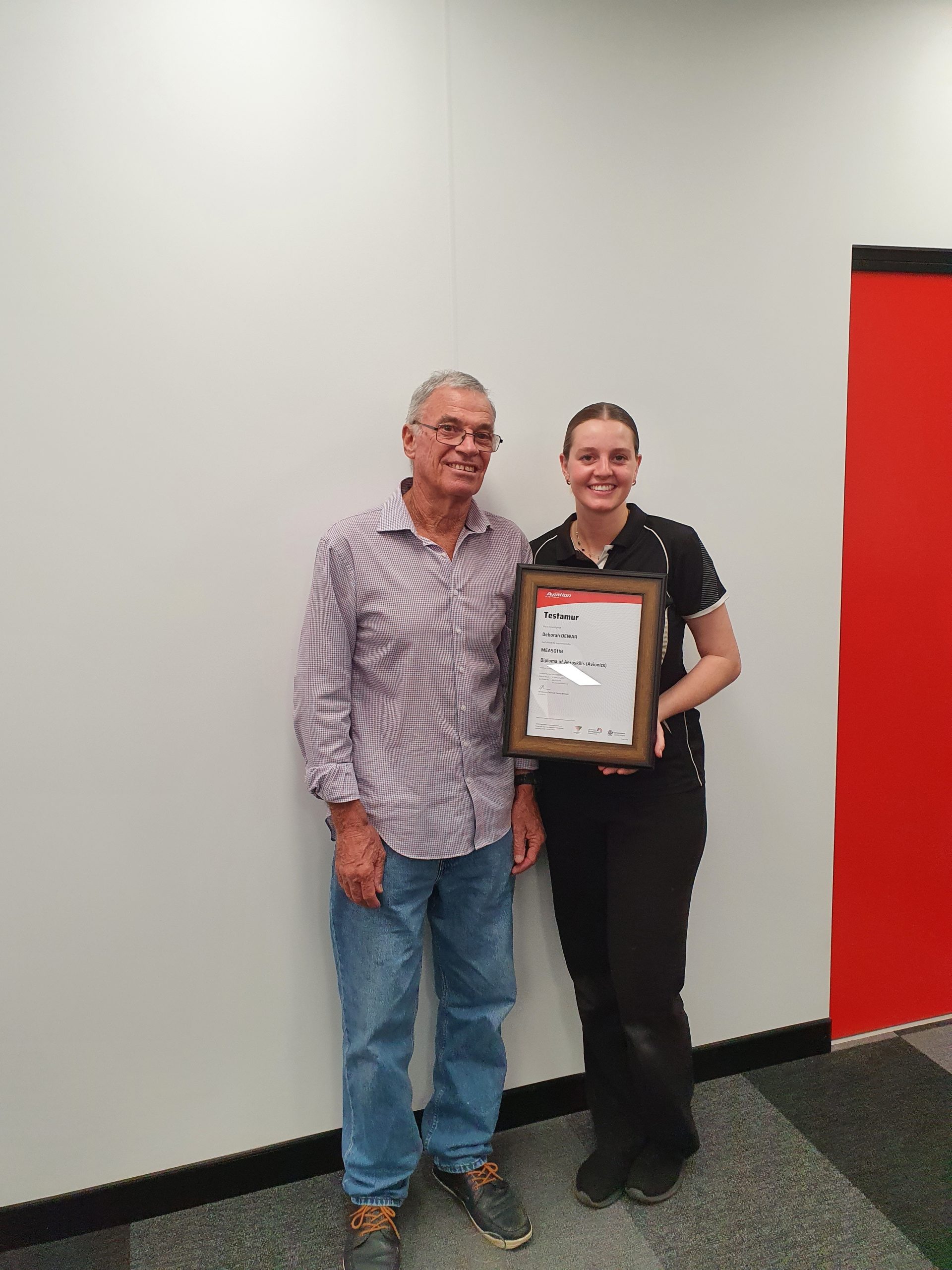 Deborah Dewar with her mentor John Cureton when she received her avionics diploma. © Deborah Dewar