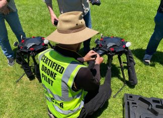 One of Skycam Media’s experienced drone pilot onsite preparing for flight.