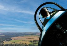 Image: pilot instructor in a light aircraft in the sky