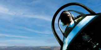 Image: pilot instructor in a light aircraft in the sky