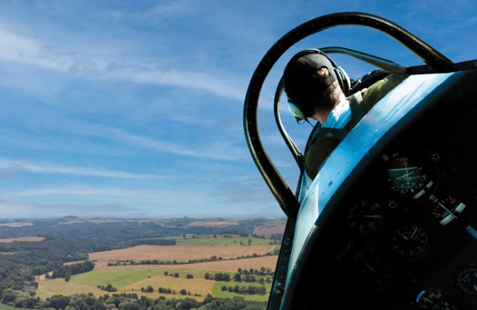 Image: pilot instructor in a light aircraft in the sky