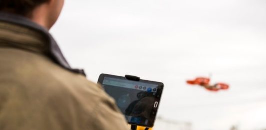 person flying a drone