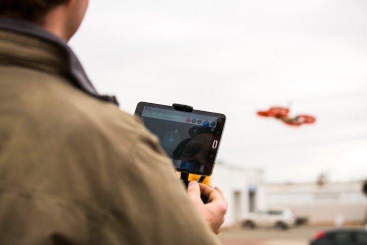 person flying a drone