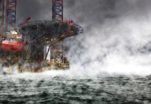 an offshore oil rig in cloudy conditions