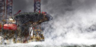 an offshore oil rig in cloudy conditions