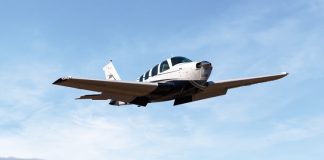 Aircraft flying over land in the sky