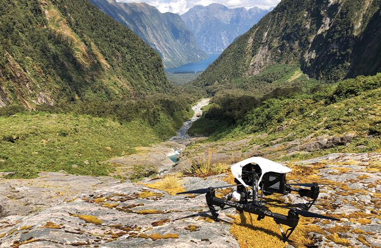 Conducting fieldwork in Pembroke Valley, Fiordland, New Zealand. Milford Sound can be seen at the base of the valley. The field crew were transported in by helicopter and spent a week (with as many spare batteries as possible!) creating high-resolution 3D models of the cliffs using a DJI Inspire.