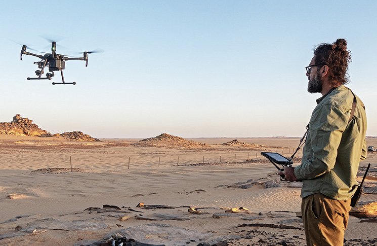 Cover image: John Fardoulis using an industrial drone to find buried landmines by measuring temperature anomalies in the sand — more than 30,000 landmines remain active at that location in northern Chad