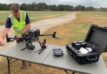 Wayne Condon conducting pre-flight checks for HQ Plantations, fire operations and intel gathering.