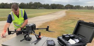 Wayne Condon conducting pre-flight checks for HQ Plantations, fire operations and intel gathering.