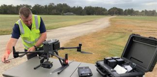 Wayne Condon conducting pre-flight checks for HQ Plantations, fire operations and intel gathering.