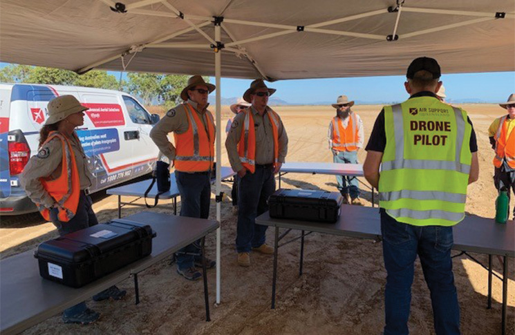 Andrew Rankin (in 'Drone Pilot' vest), Senior Base Pilot for Air Support Queensland and UAV Training Australia, briefing Queensland Parks and Wildlife RPAS candidates for their air operations and training requirements