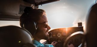 Pilot in Cockpit aircraft in the sky