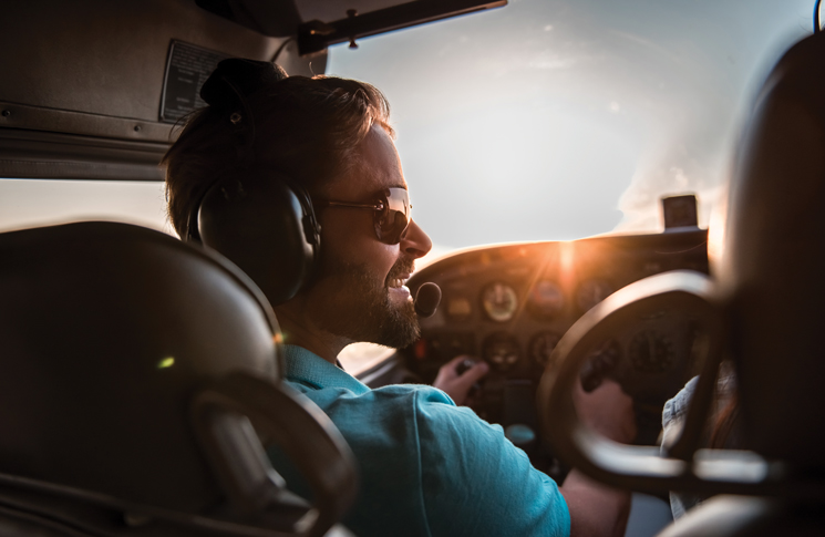 Pilot in Cockpit aircraft in the sky