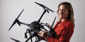 Woman holding a drone