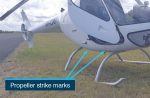 Propeller strike mark and skid damage to VH-LTO