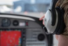 Pilot wearing headset.