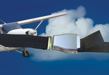 Abstract image of aircraft flying in the sky and a seatbelt