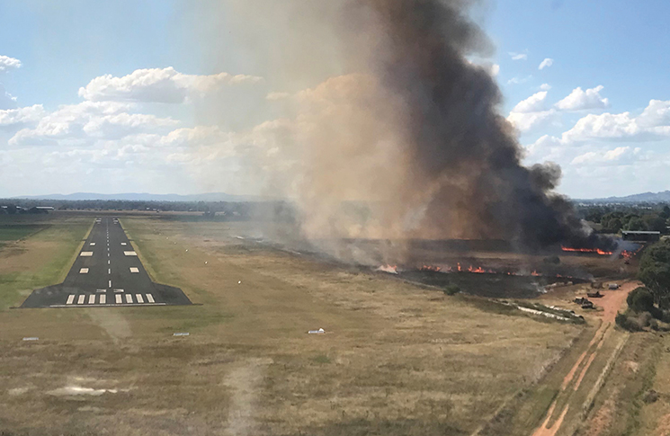 A view of a burn-off at Cowra, NSW seen from an aircraft in the sky