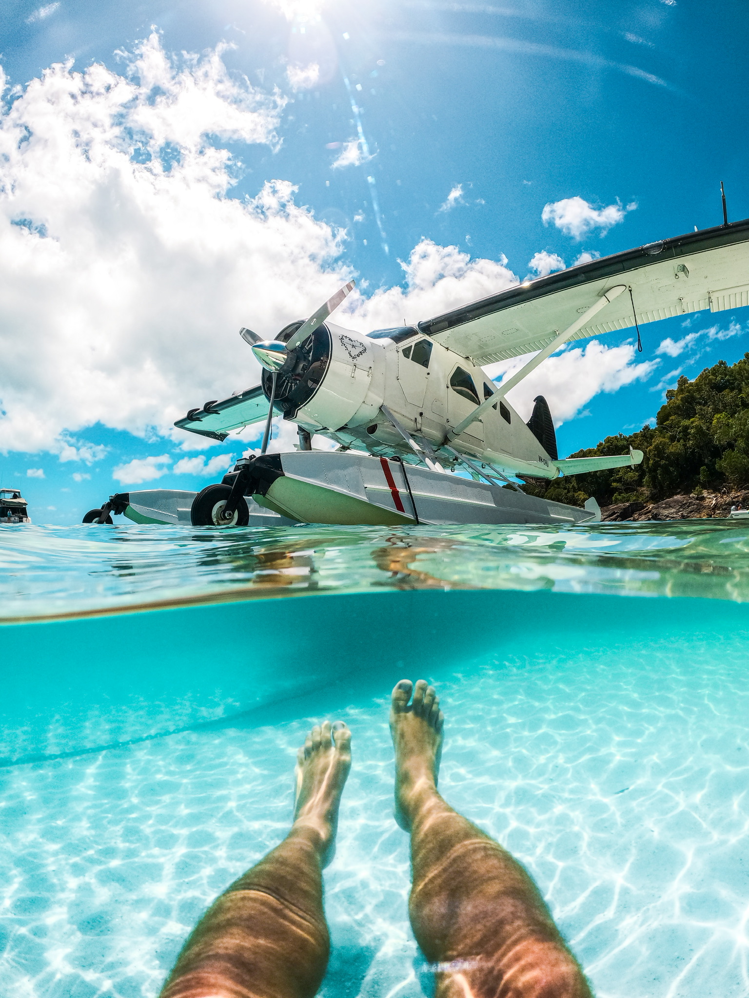 Photo by Izzy J Ryan. Kicking back at Whitehaven beach with our Dehavilland Beaver.