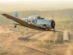 Photo by Lloyd Greenfield. North American T-6D Harvard, flying just south of Darwin, NT.