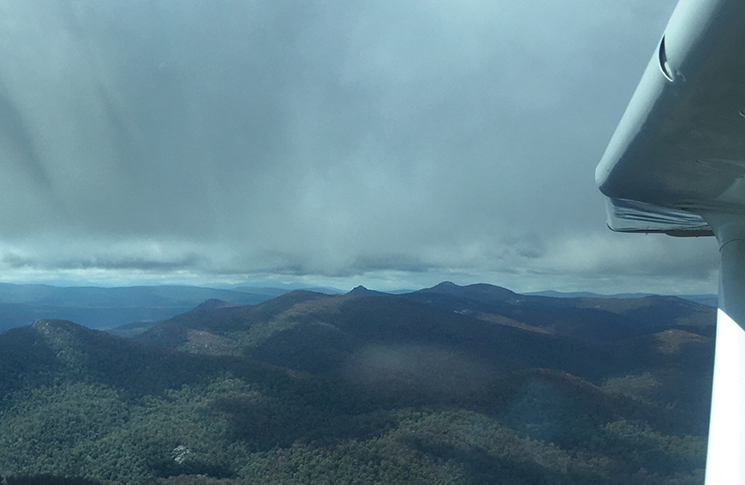 A view of low cloud over the ranges, Victoria from an aircraft in the sky